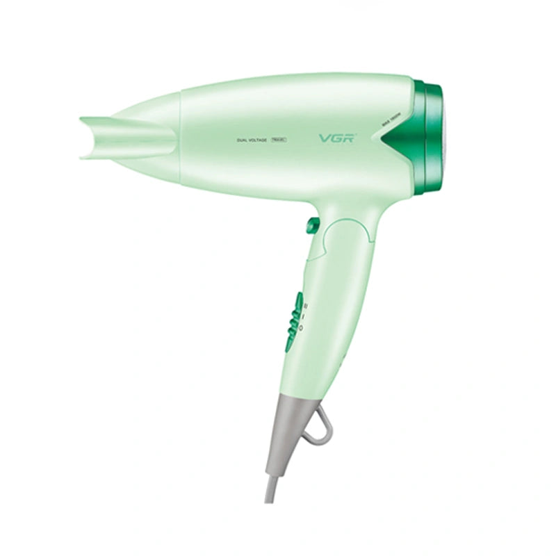 A pink VGR foldable hair dryer next to its packaging box, which features an image of a woman with long hair.